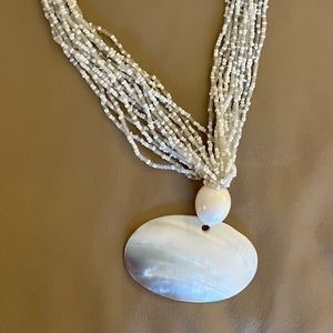 Beaded white/light grey necklace.  23” with extender, 21” beaded portion.